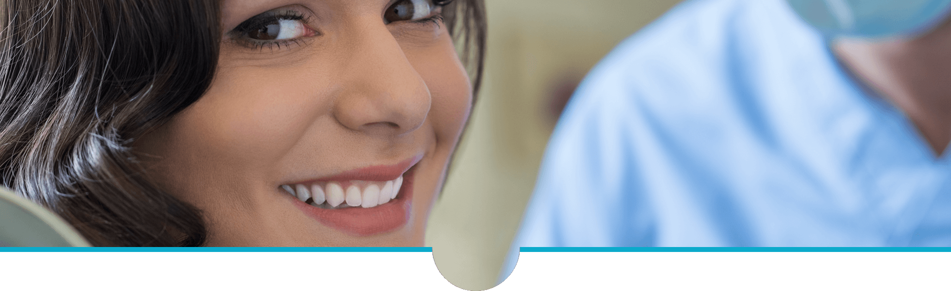Smiling woman at dental clinic